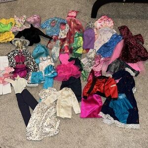 Large Lot of Barbie & Ken Clothing